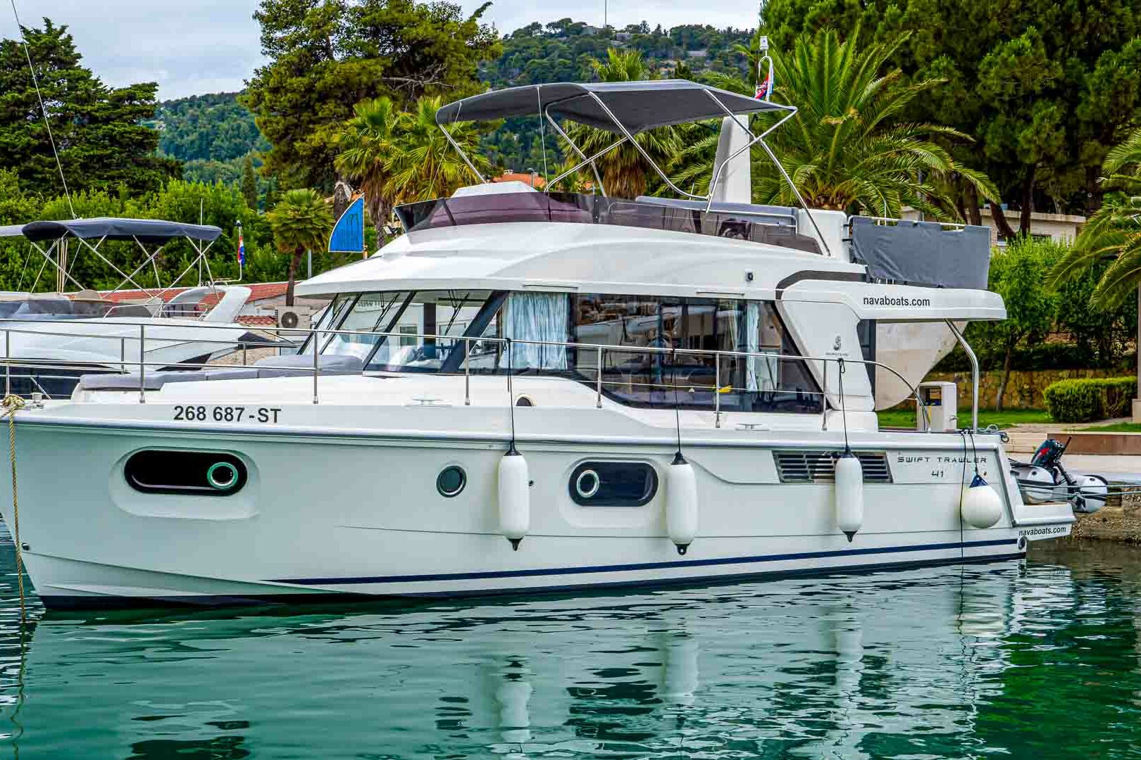Motor boat Swift Trawler 41 in marina