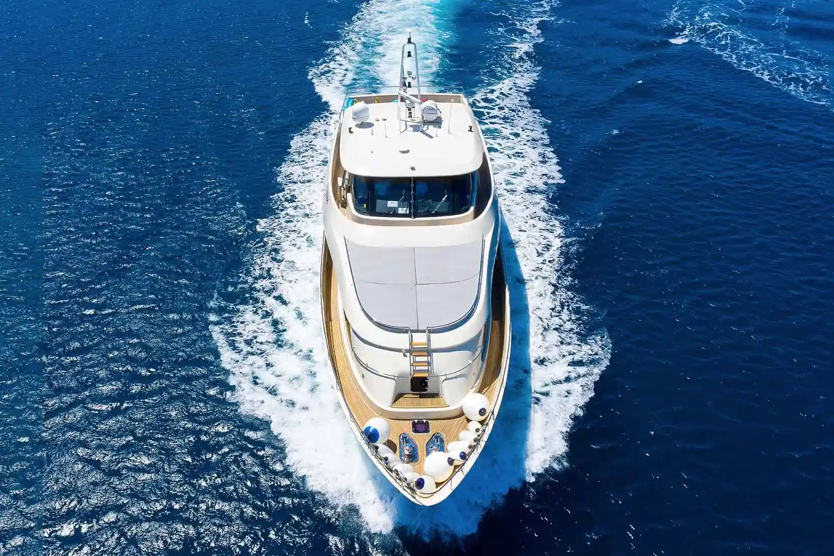 Luxury yacht Grace running bow view