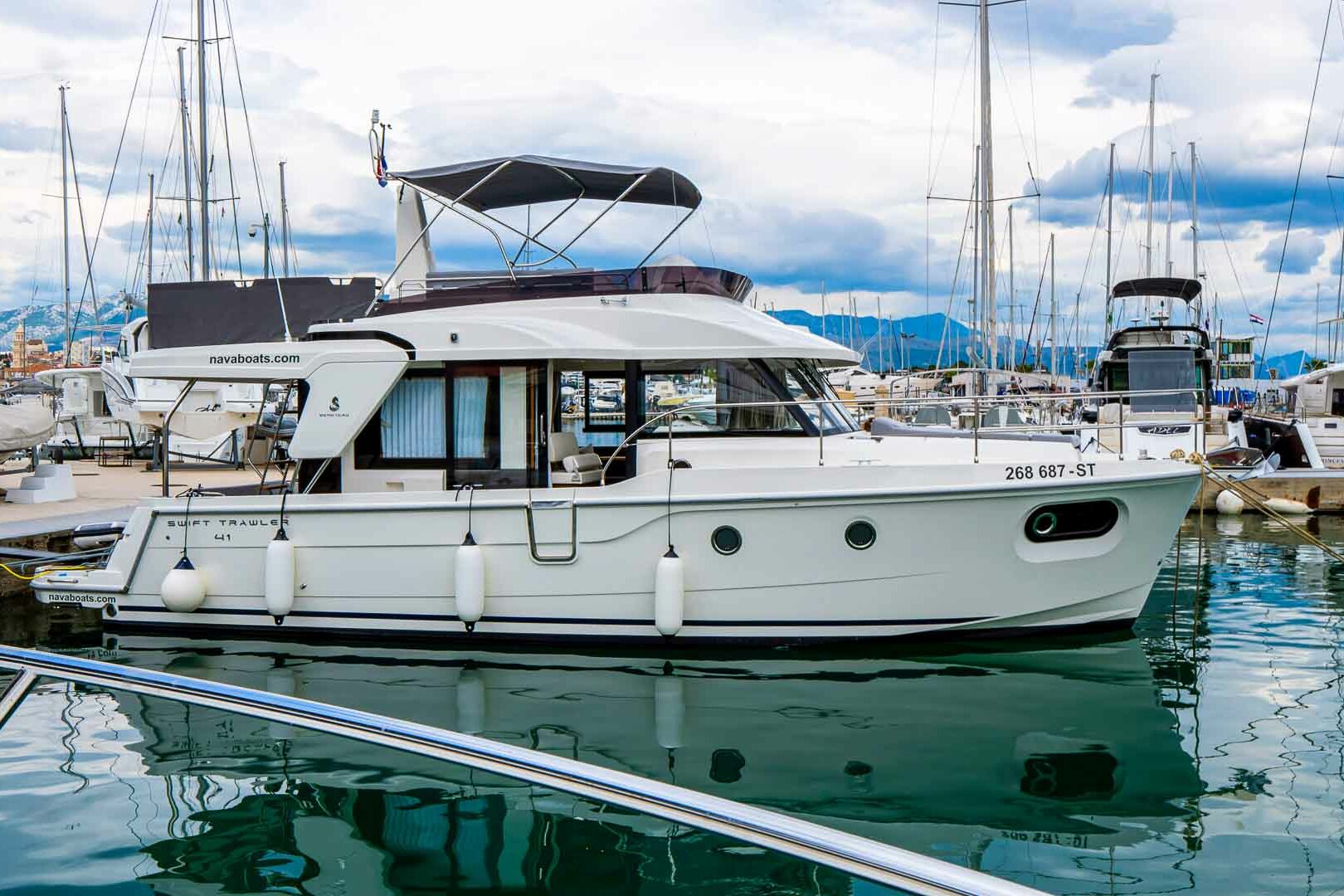 Motor boat Swift Trawler 41 marina mooring