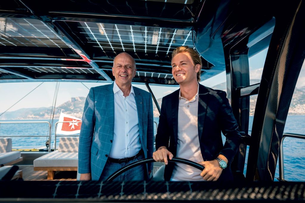 This is photo of a Francis Lapp and Nico Rosberg